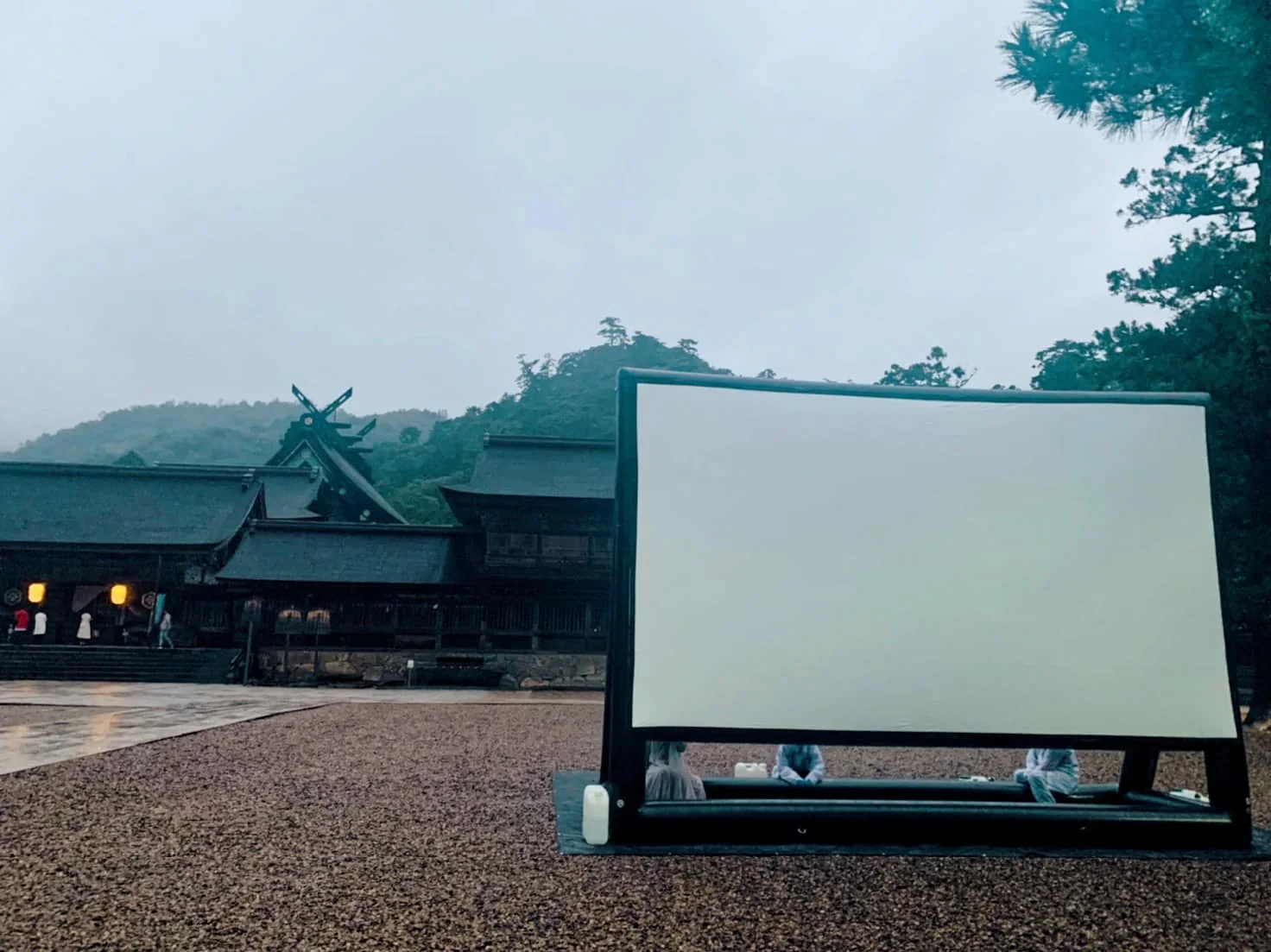 The screen for the offering screening set up in front of the shrine buildings at Izumo Taisha